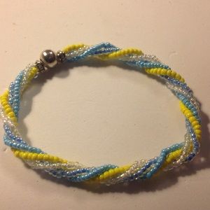 4 strand bracelet twisted .. yellow, blue & white